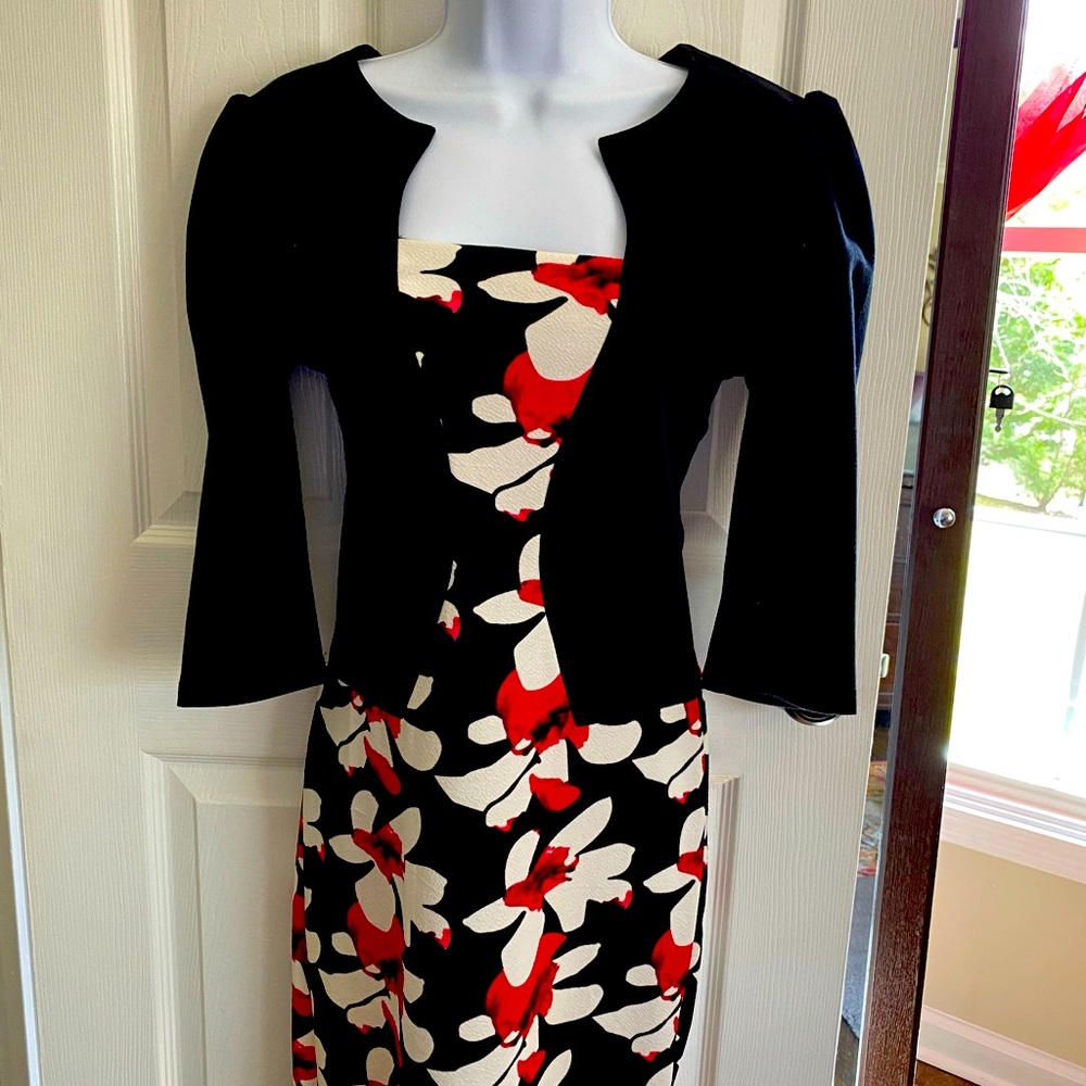 Beautiful form fitting dress Never Worn!